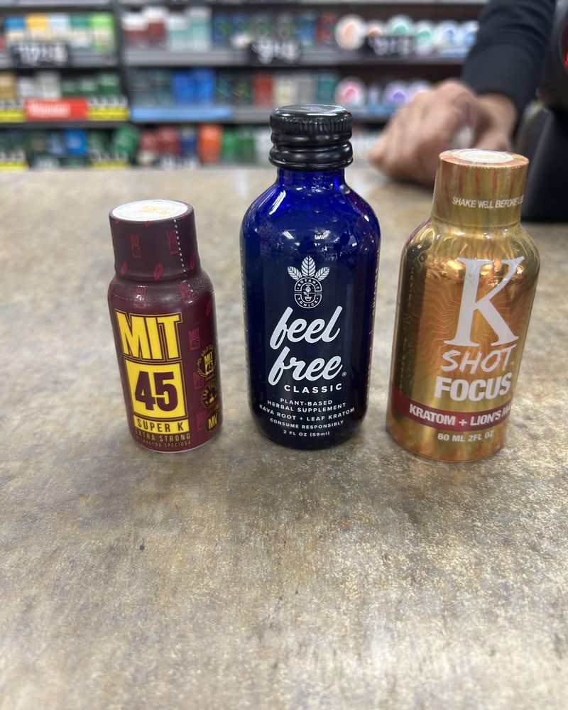 Kratom shot bottles sold on a store shelf
